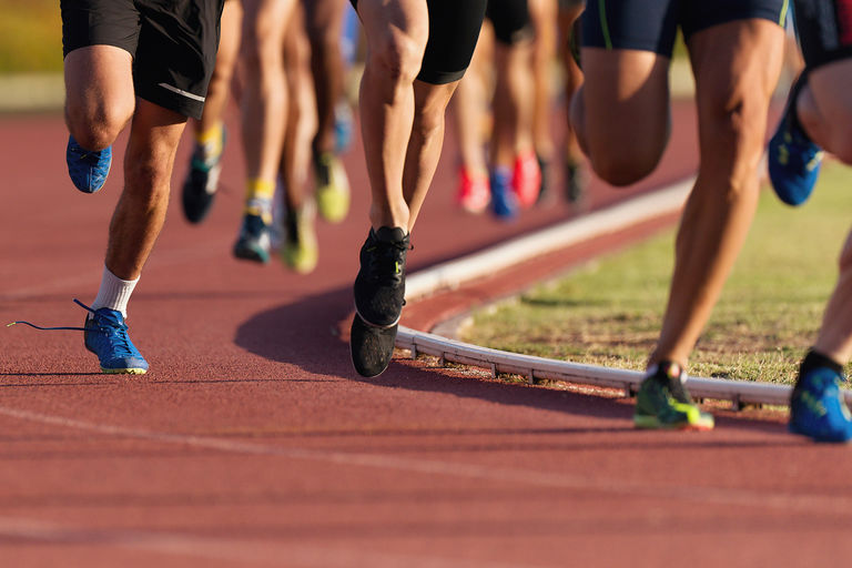 Athletics people running on the track field