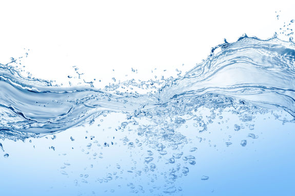 Water and air bubbles over white background
