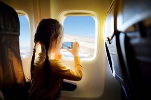 child-sat-in-the-interiors-of-an-aircraft