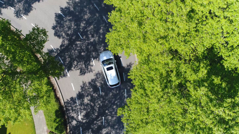 Aerial picture of a clean technologies car on a road